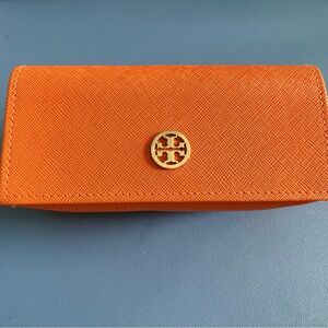 Tory Burch Orange Saffiano Leather eye glass case.